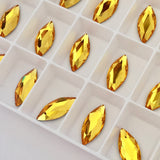 real photo of sunflower coloured stones in marquise navette cut flat back article 2201