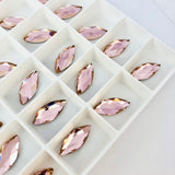 real photo in tray of Swarovski crystal article 2201 marquise stones in Vintage Rose colour