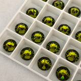 photo of Swarovski olivine crystals in tray